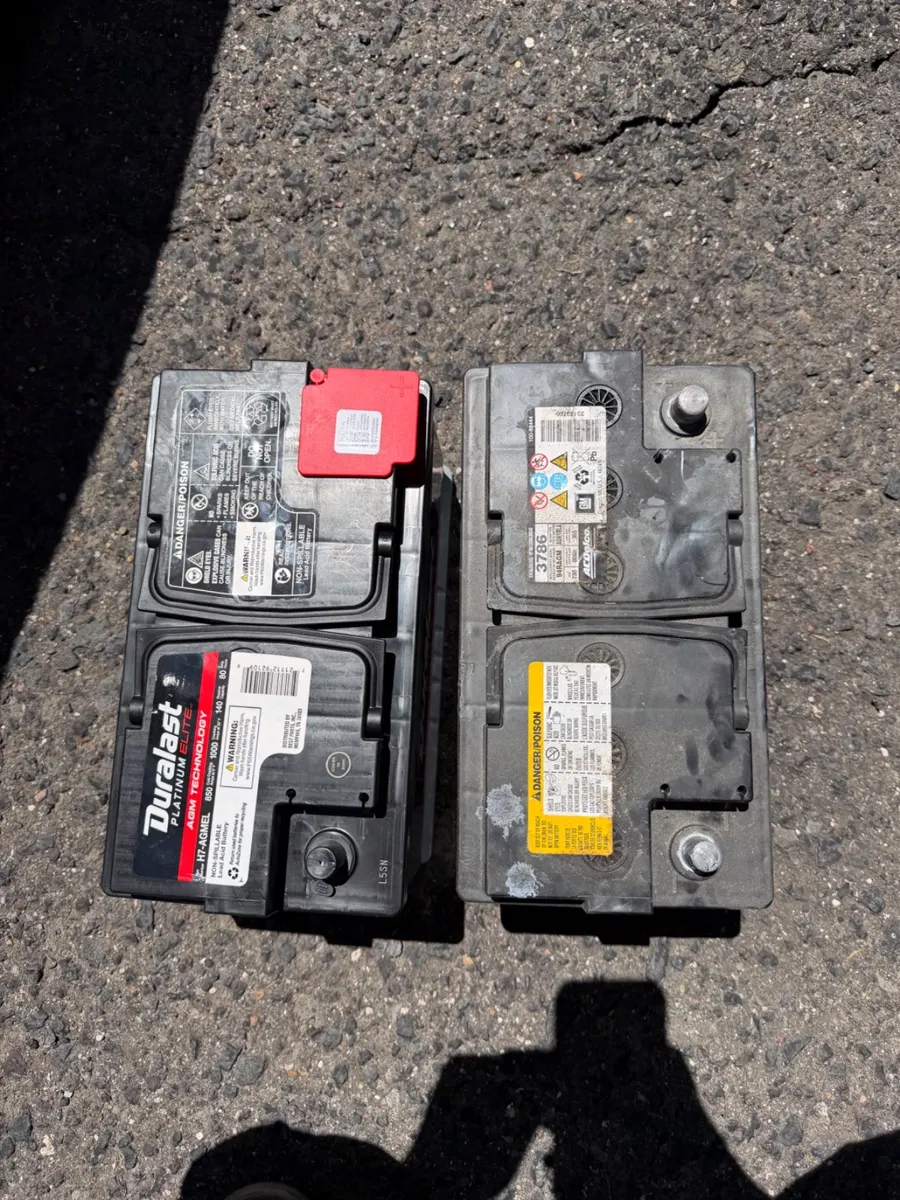 Old battery next to the new AGM battery
