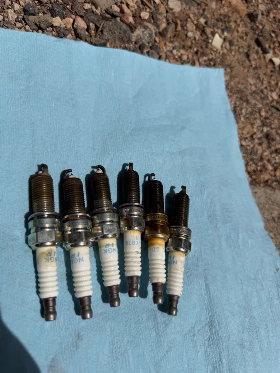 All six old spark plugs removed